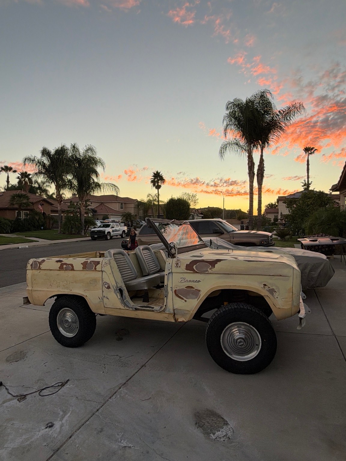 Side view of the 1966 Bronco U13 survivor showing its open cabin and weathered finish at sunset.